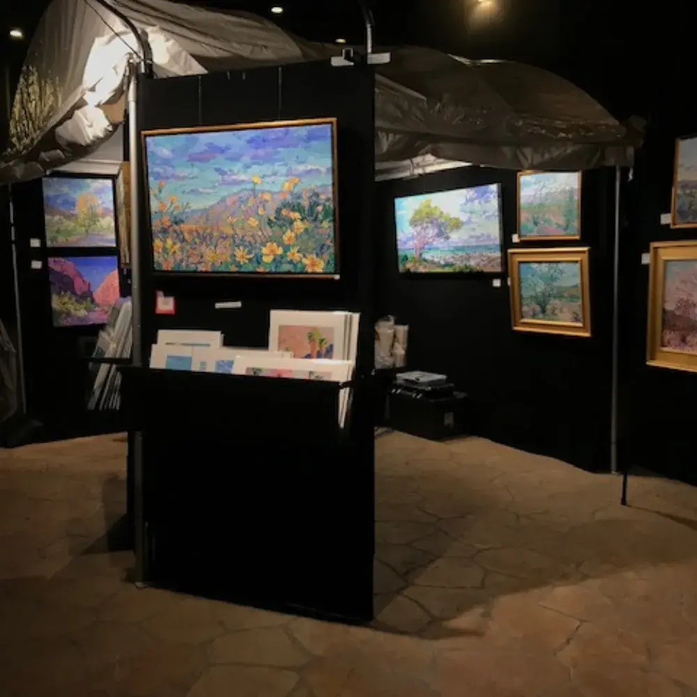 Interior view of Jason Nelson Gallery with diverse artwork on display in Spring Valley, NV.