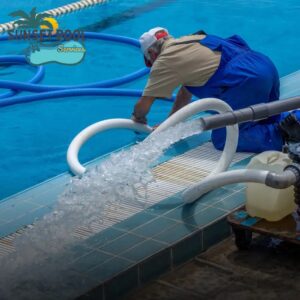 A pool technician adjusting a cleaning schedule for seasonal pool maintenance.